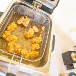 crispy fried oysters in a fry basket