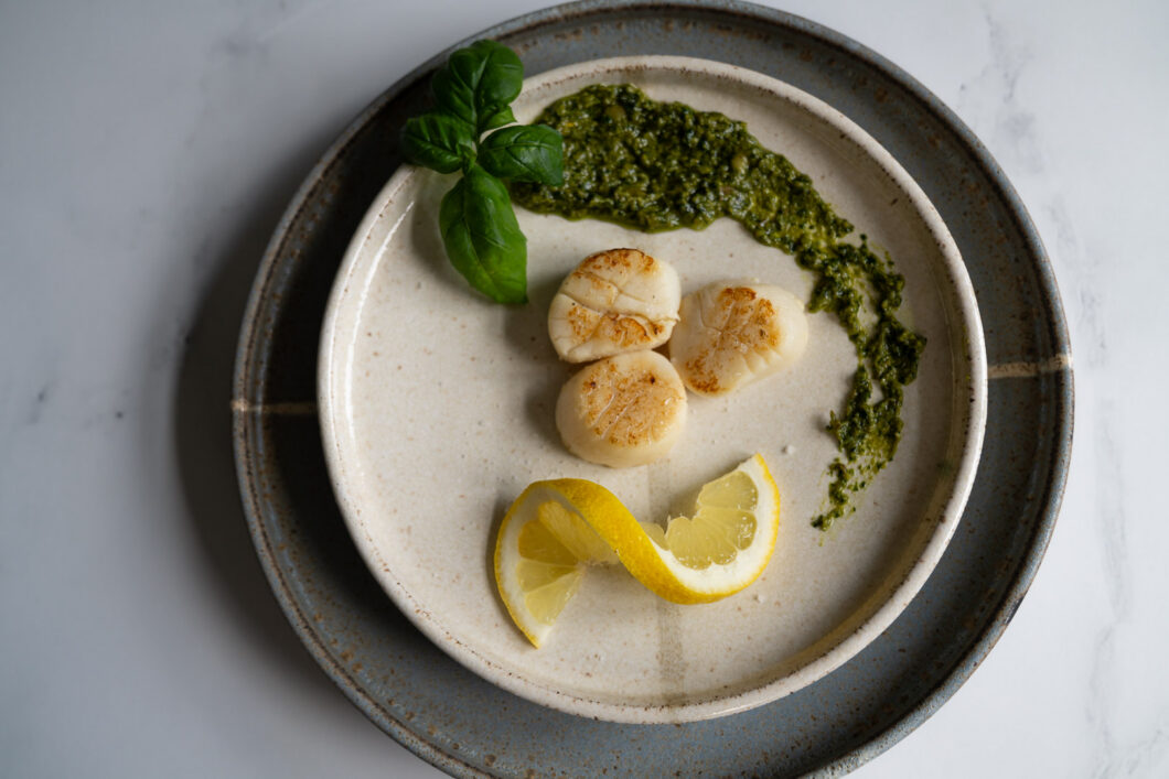sous vide scallops on a serving plate