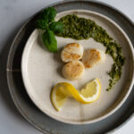 sous vide scallops on a serving plate
