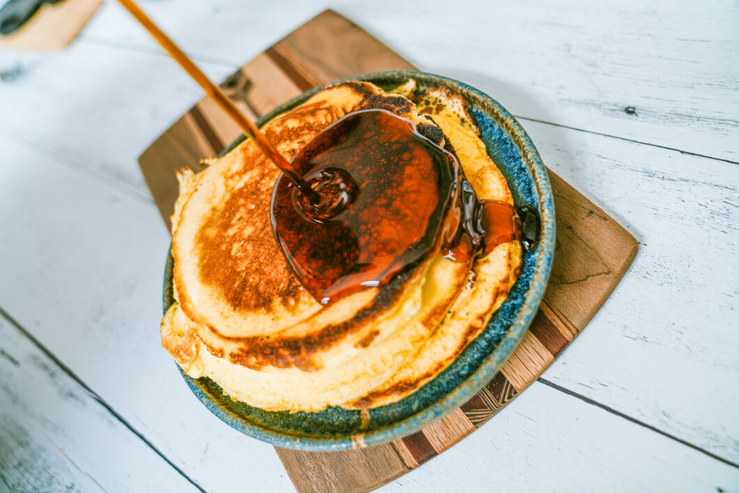 Browned Butter Pancakes with syrup on breakfast plate