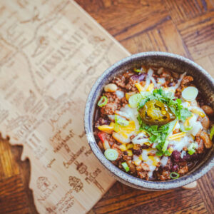 hearty chicken and turkey chili in a serving dish